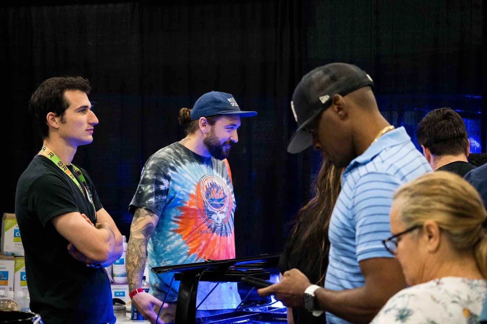 Group of people standing together at a coral event.