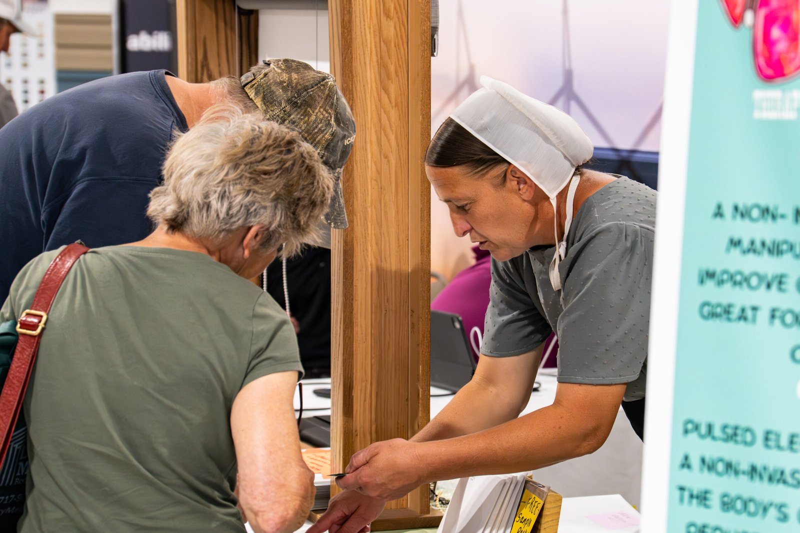 Photograph of lady showing of something with great intent