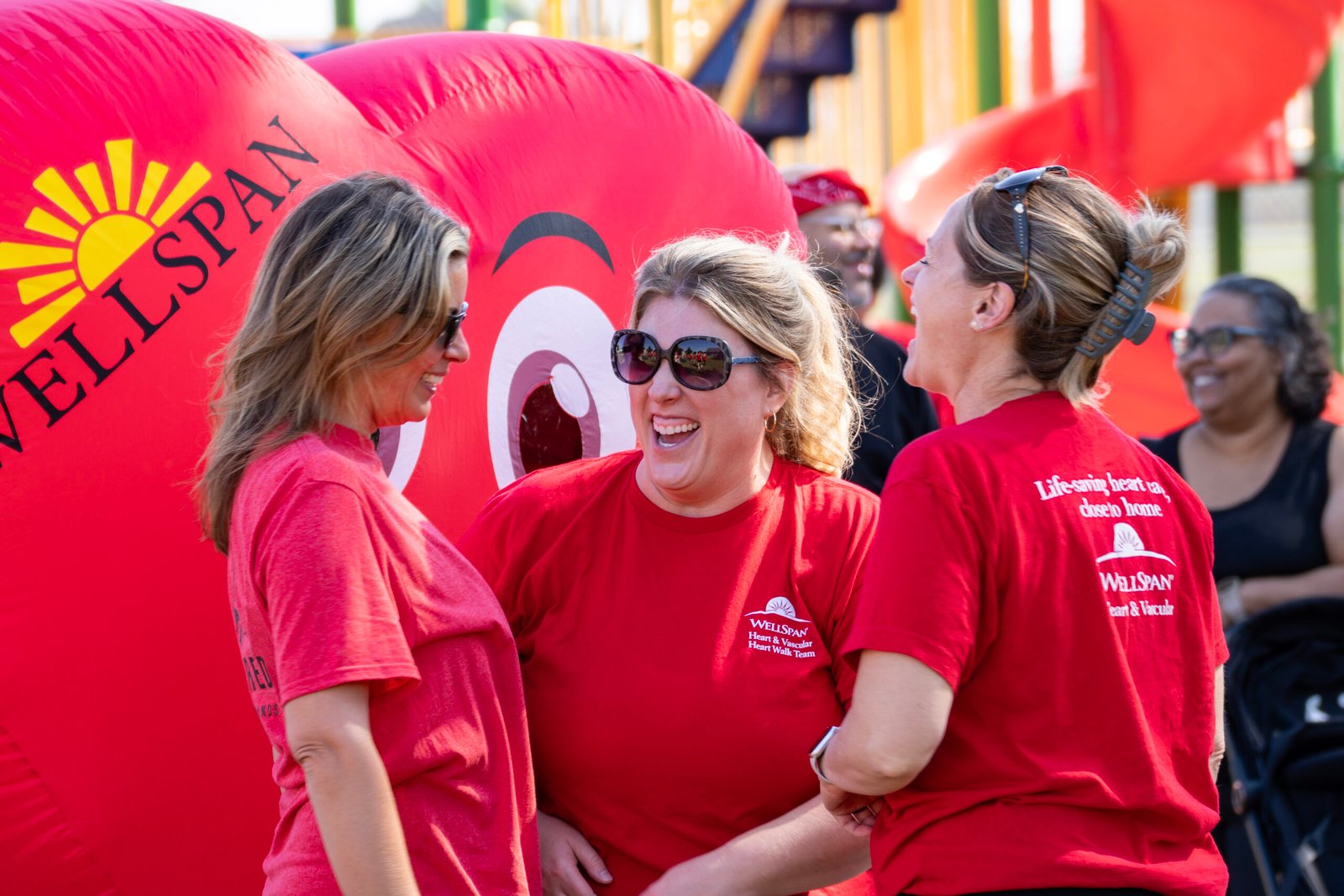 Group of ladies interacting with each other having a good time.