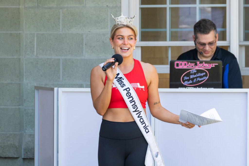 Miss PA announcing next speakers.