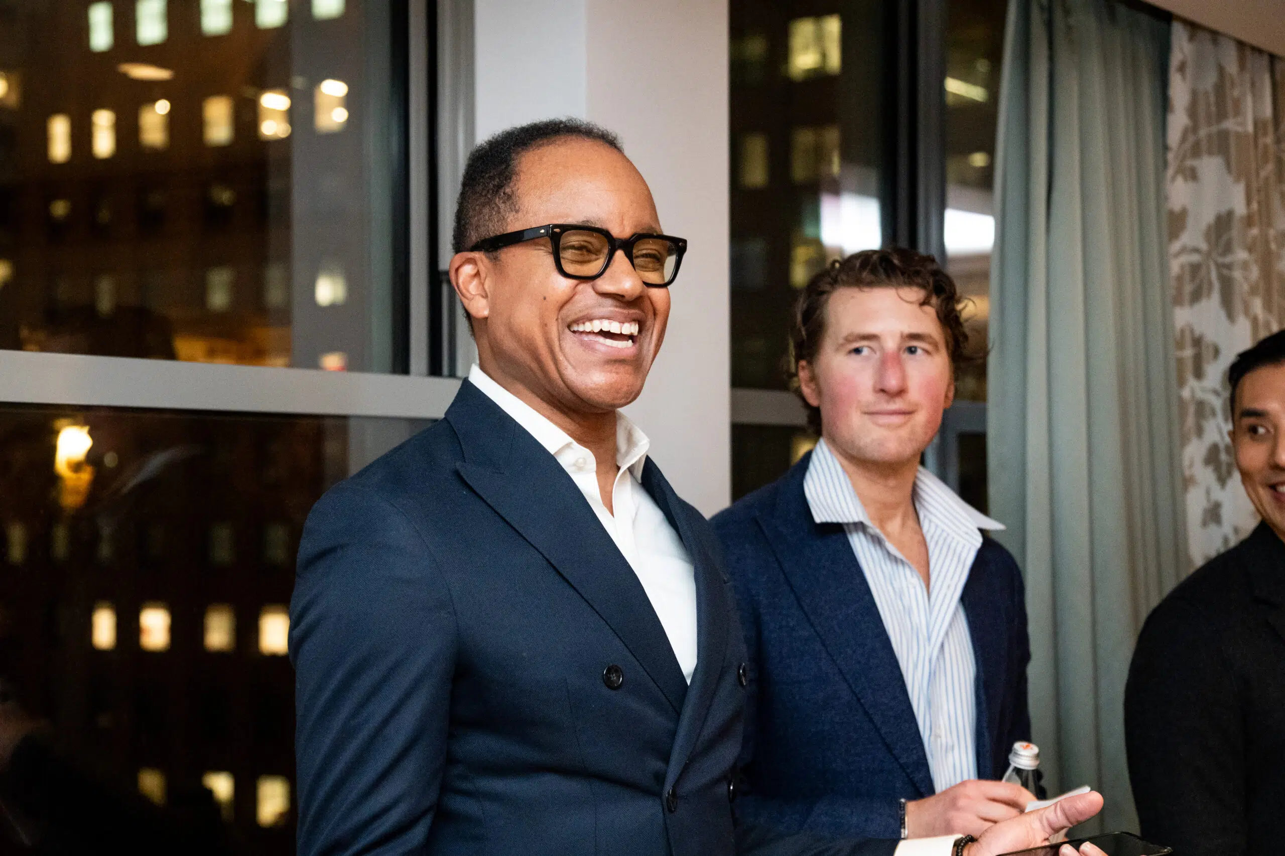 Event Speaker laughing at the event.