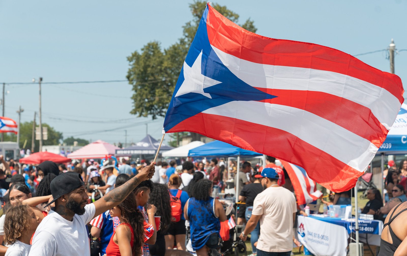Waving Puerto Rican Flag at a Event